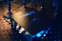 InviscoGig device on a metallic surface with blue lighting